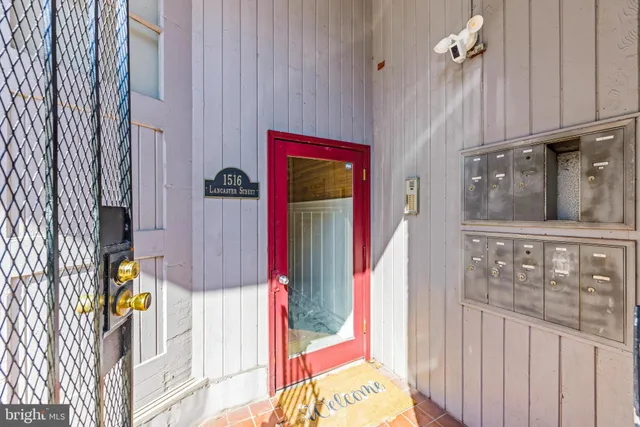 a view of a hallway with entryway