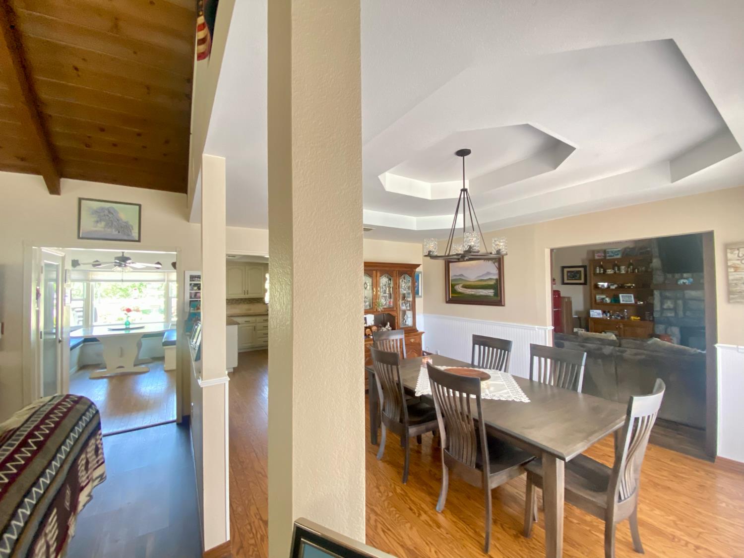 5012 Ustick Road Modesto, CA 95358 - Photo 20 of 26 a dining room with furniture window and wooden floor
