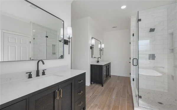 a kitchen with a sink and refrigerator