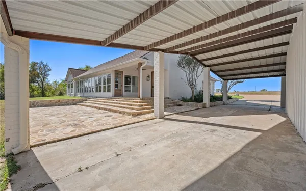 a view of house with garage
