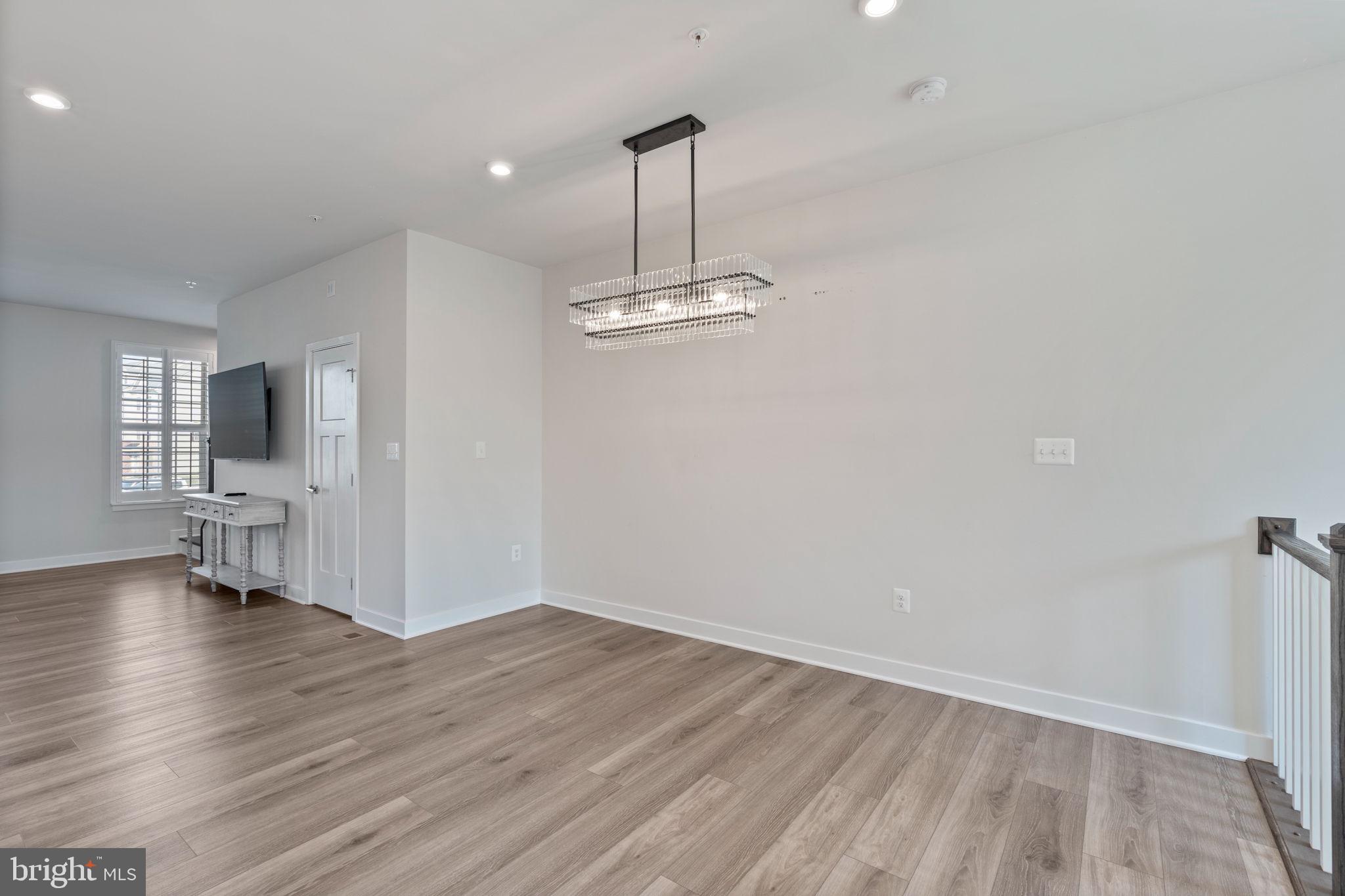 7904 Brandy Station Road Hanover, MD 21076 - Photo 20 of 49 Dining leading into Living Room