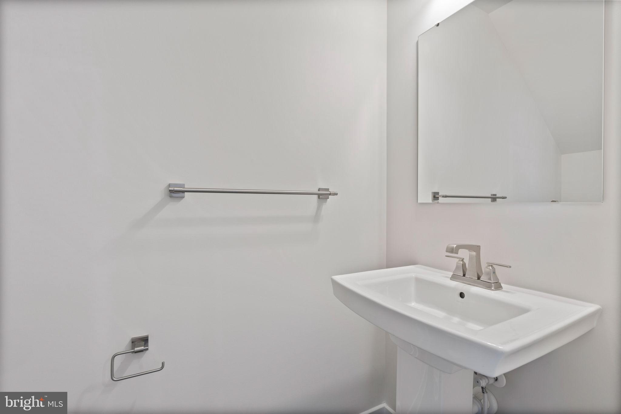 7904 Brandy Station Road Hanover, MD 21076 - Photo 23 of 49 Main level powder room