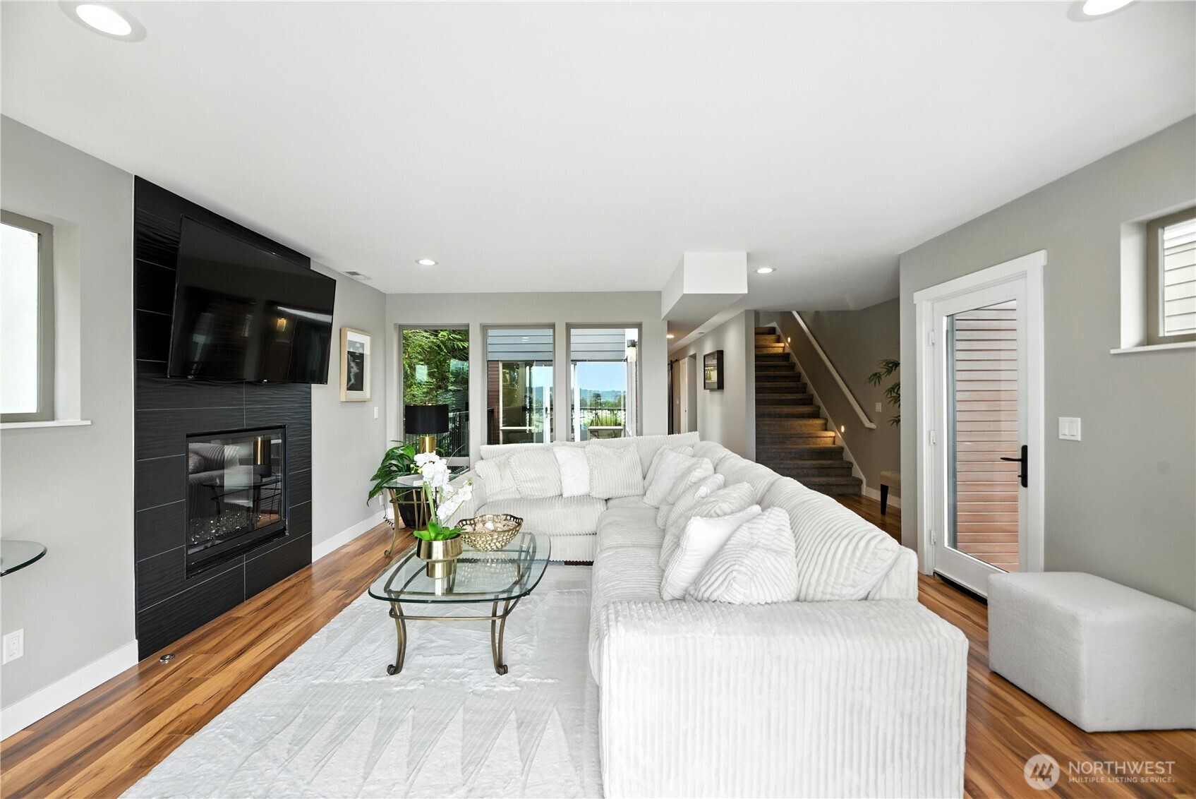 8221 South 121st Street Seattle, WA 98178 - Photo 1 of 37 a living room with furniture fireplace and flat screen tv