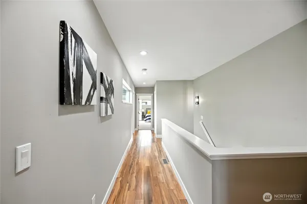 a view of a hallway with staircase