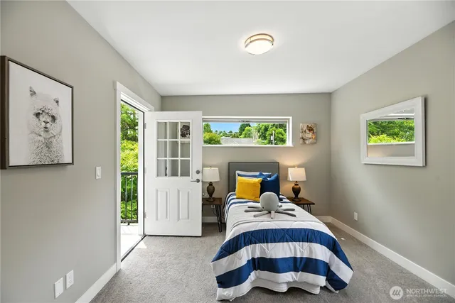 a living room with furniture and a gate