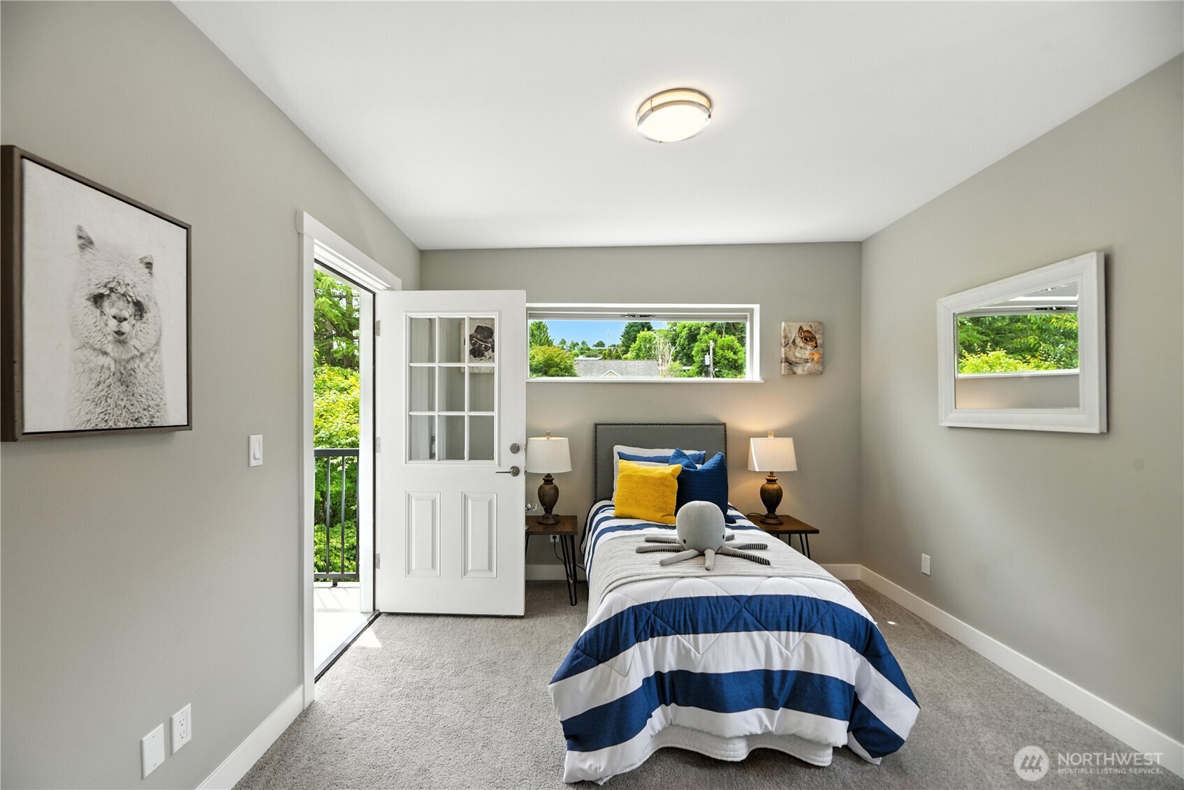 8221 South 121st Street Seattle, WA 98178 - Photo 32 of 37 a living room with furniture and a gate