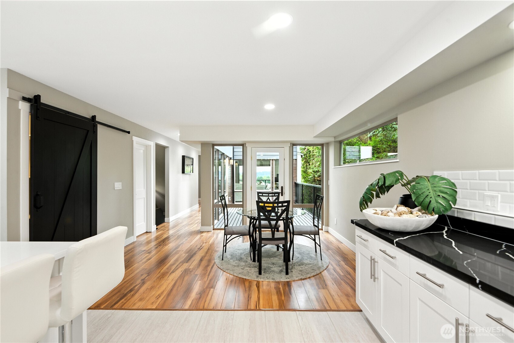 8221 South 121st Street Seattle, WA 98178 - Photo 8 of 37 a living room with furniture and a large window