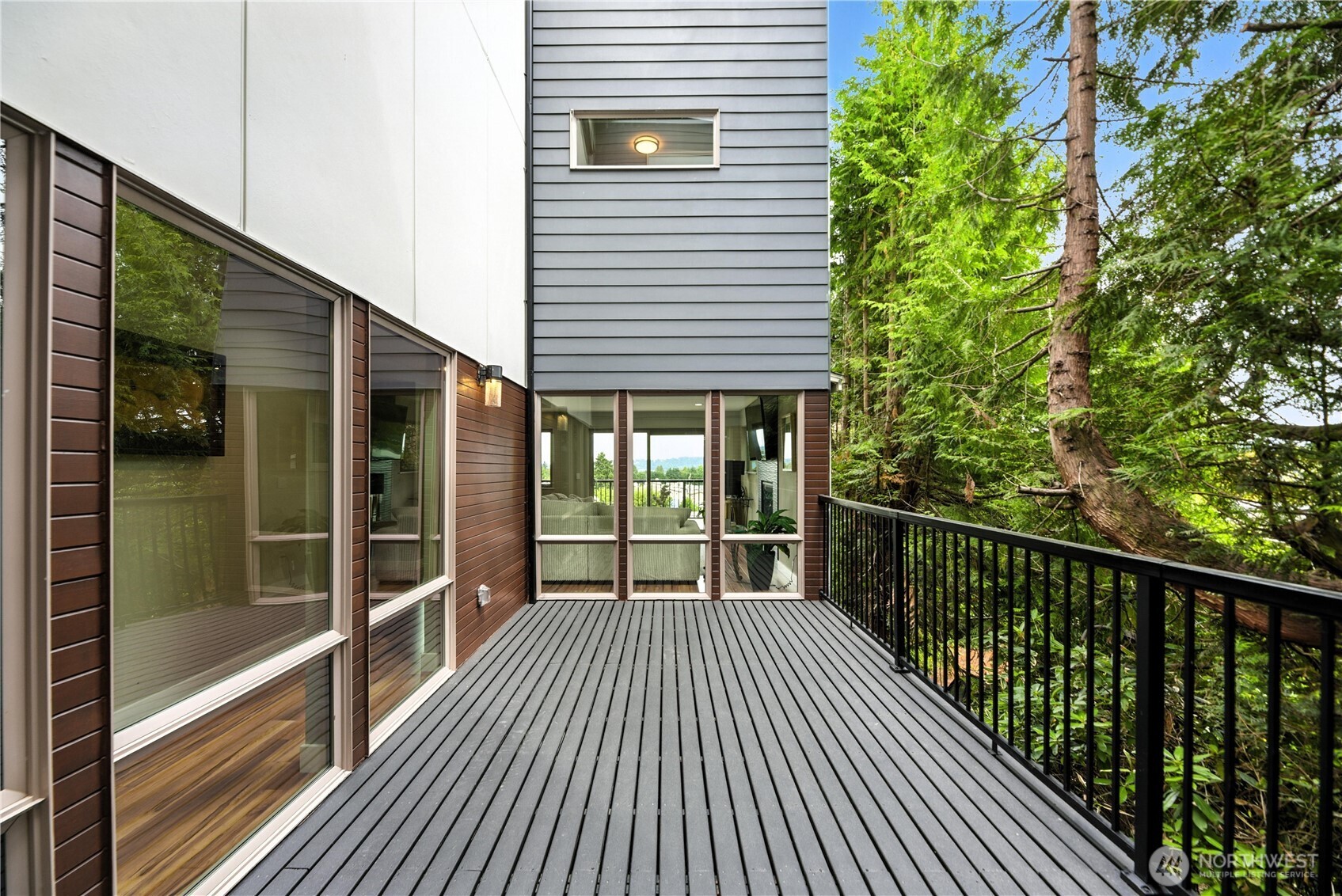 8221 South 121st Street Seattle, WA 98178 - Photo 10 of 37 a view of a house with a balcony