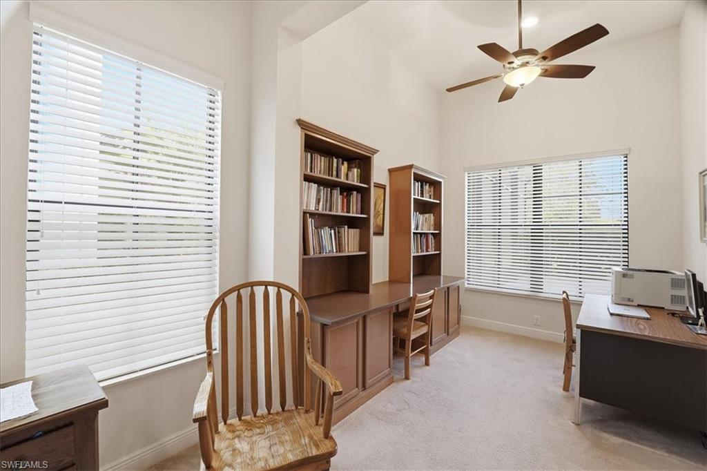 5149 Roma Street Ave Maria, FL 34142 - Photo 20 of 50 a view of a workspace with furniture and a window