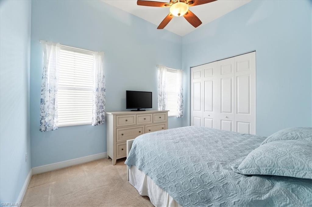 5149 Roma Street Ave Maria, FL 34142 - Photo 33 of 50 a bedroom with a bed and a flat screen tv
