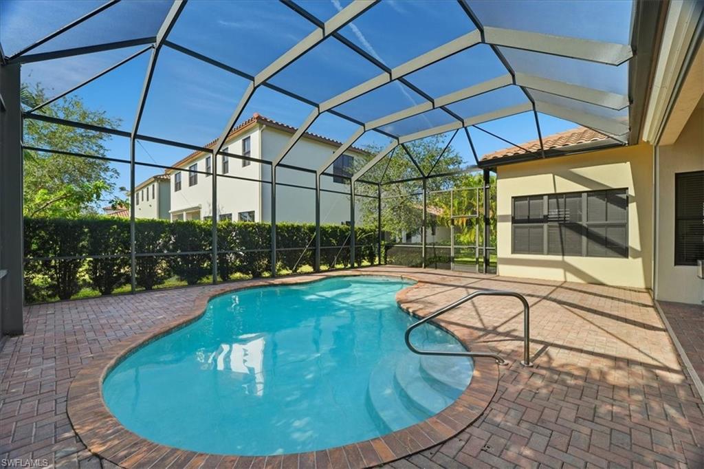 5149 Roma Street Ave Maria, FL 34142 - Photo 41 of 50 a view of a swimming pool with a patio
