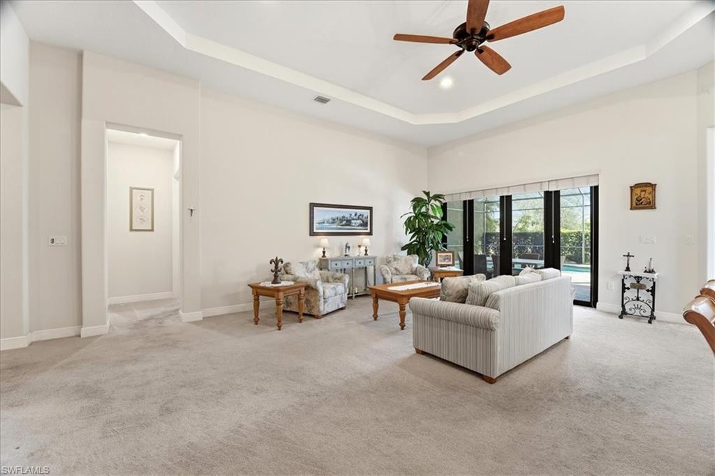 5149 Roma Street Ave Maria, FL 34142 - Photo 7 of 50 a living room with furniture and a window