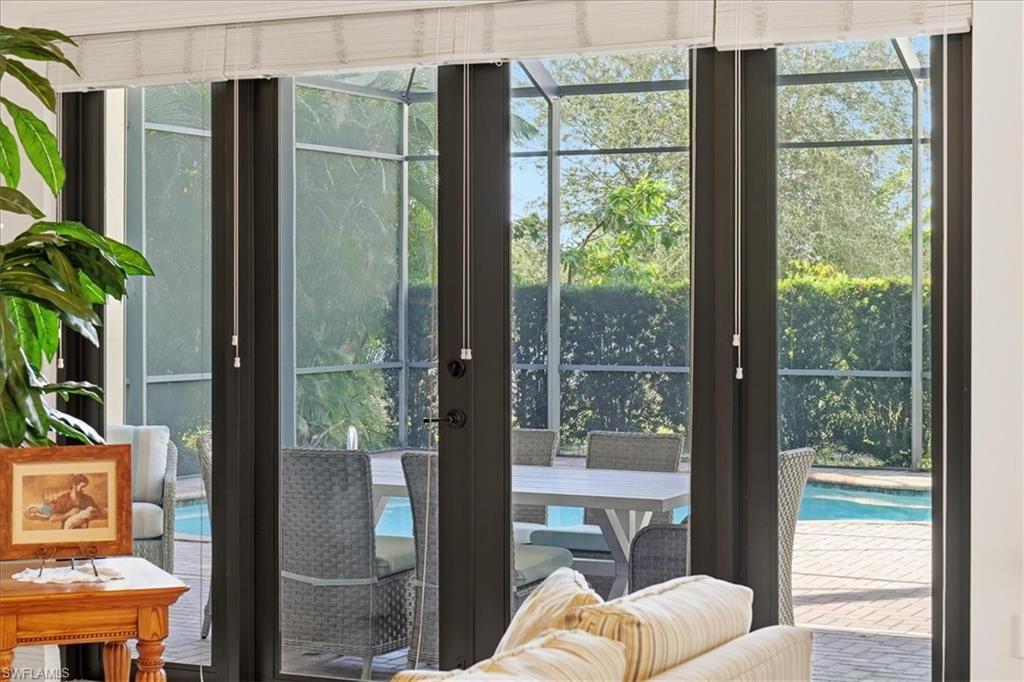 5149 Roma Street Ave Maria, FL 34142 - Photo 10 of 50 a living room with furniture and a window