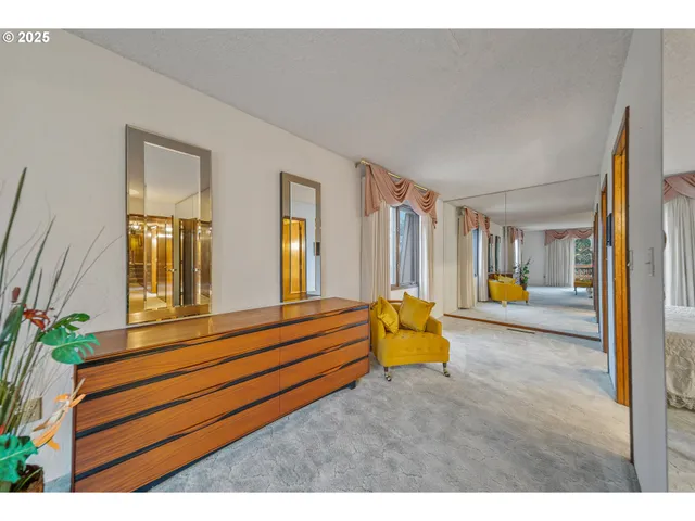 a bathroom with a sink a mirror and a toilet