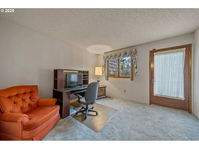 a bathroom with a sink a mirror and a shower