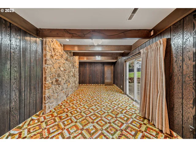 a kitchen with a sink and a stove top oven