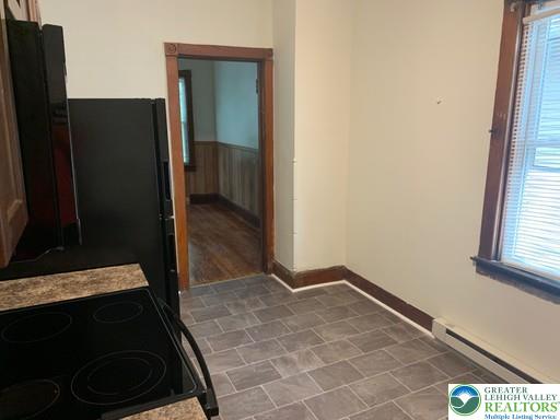 1030 Center Street, Unit 2 Bethlehem, PA 18018 - Photo 4 of 13 a view of an empty room and a window