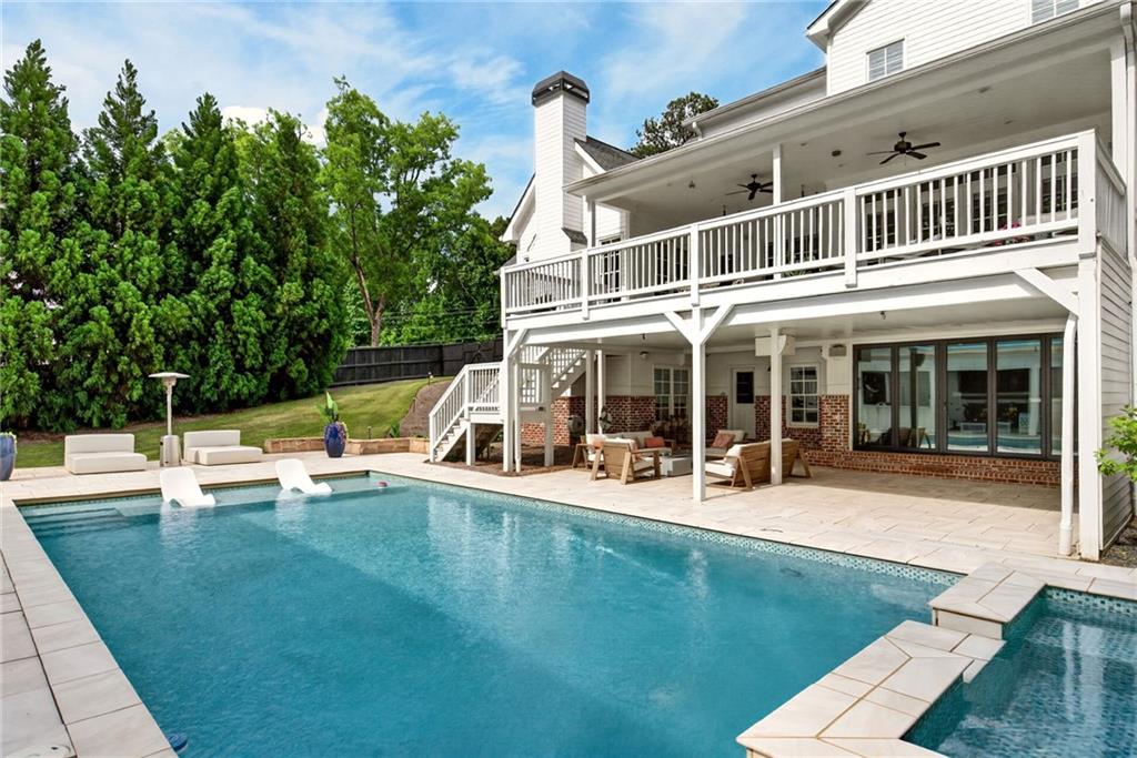 13460 New Providence Road Milton, GA 30004 - Photo 53 of 60 a view of a house with pool and sitting area