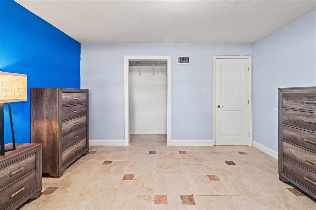 6515 Dimarco Road Tampa, FL 33634 - Photo 26 of 66 a view of room with cabinets