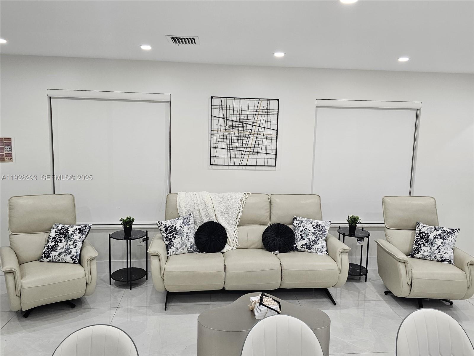 965 Northeast 171 Street Miami, FL 33162 - Photo 10 of 29 a living room with furniture and a couch