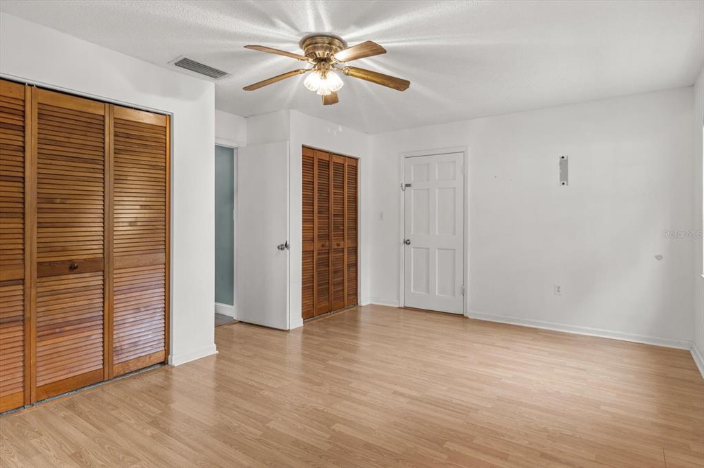 4015 Southeast 15th Street Ocala, FL 34471 - Photo 17 of 46 a view of an empty room with wooden floor