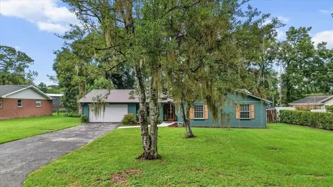 a house view with a garden space