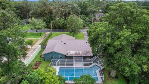 an aerial view of lake residential houses with outdoor space and lake view