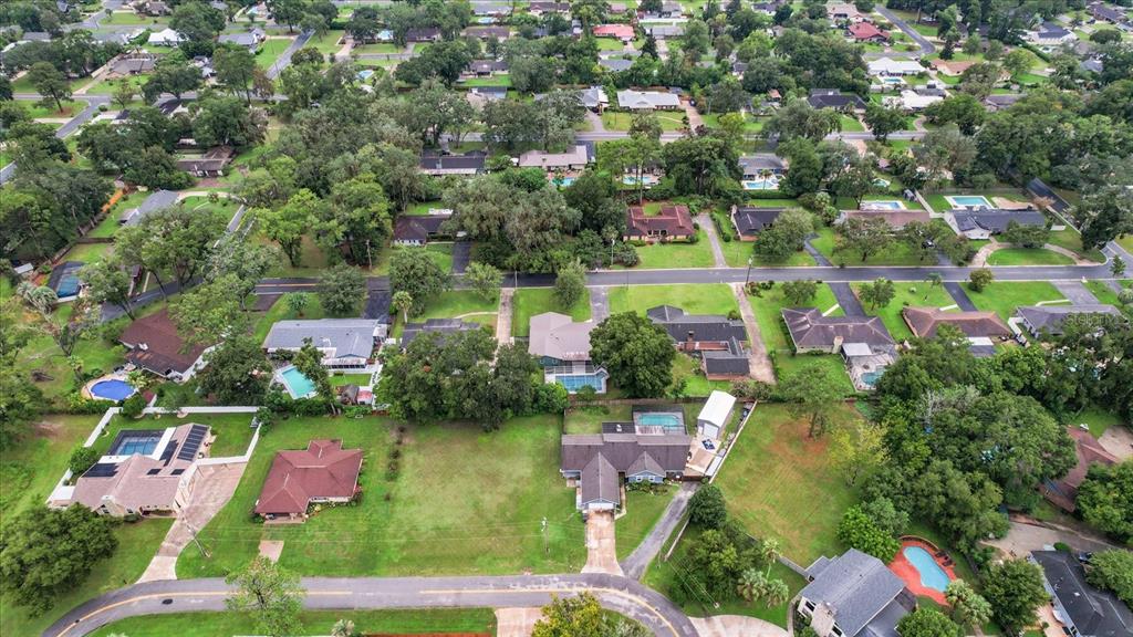 4015 Southeast 15th Street Ocala, FL 34471 - Photo 43 of 46 an aerial view of lake residential houses with outdoor space and lake view