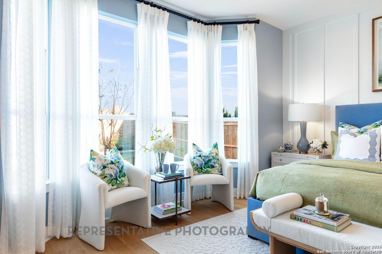 4412 Wendell Way Schertz, TX 78108 - Photo 13 of 28 a living room with furniture and a potted plant