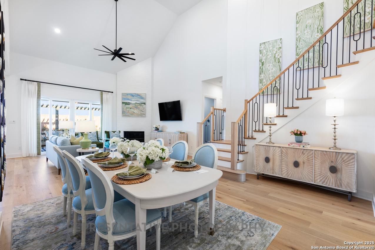 4412 Wendell Way Schertz, TX 78108 - Photo 27 of 28 a view of a dining room with furniture window and wooden floor