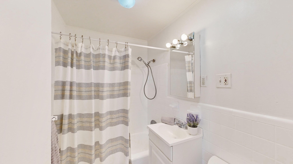 30 Pinckney Street, Unit 2 Boston, MA 02114 - Photo 13 of 18 a bathroom with a shower