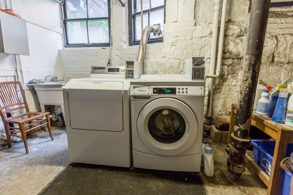 30 Pinckney Street, Unit 2 Boston, MA 02114 - Photo 16 of 18 a utility room with dryer and washer