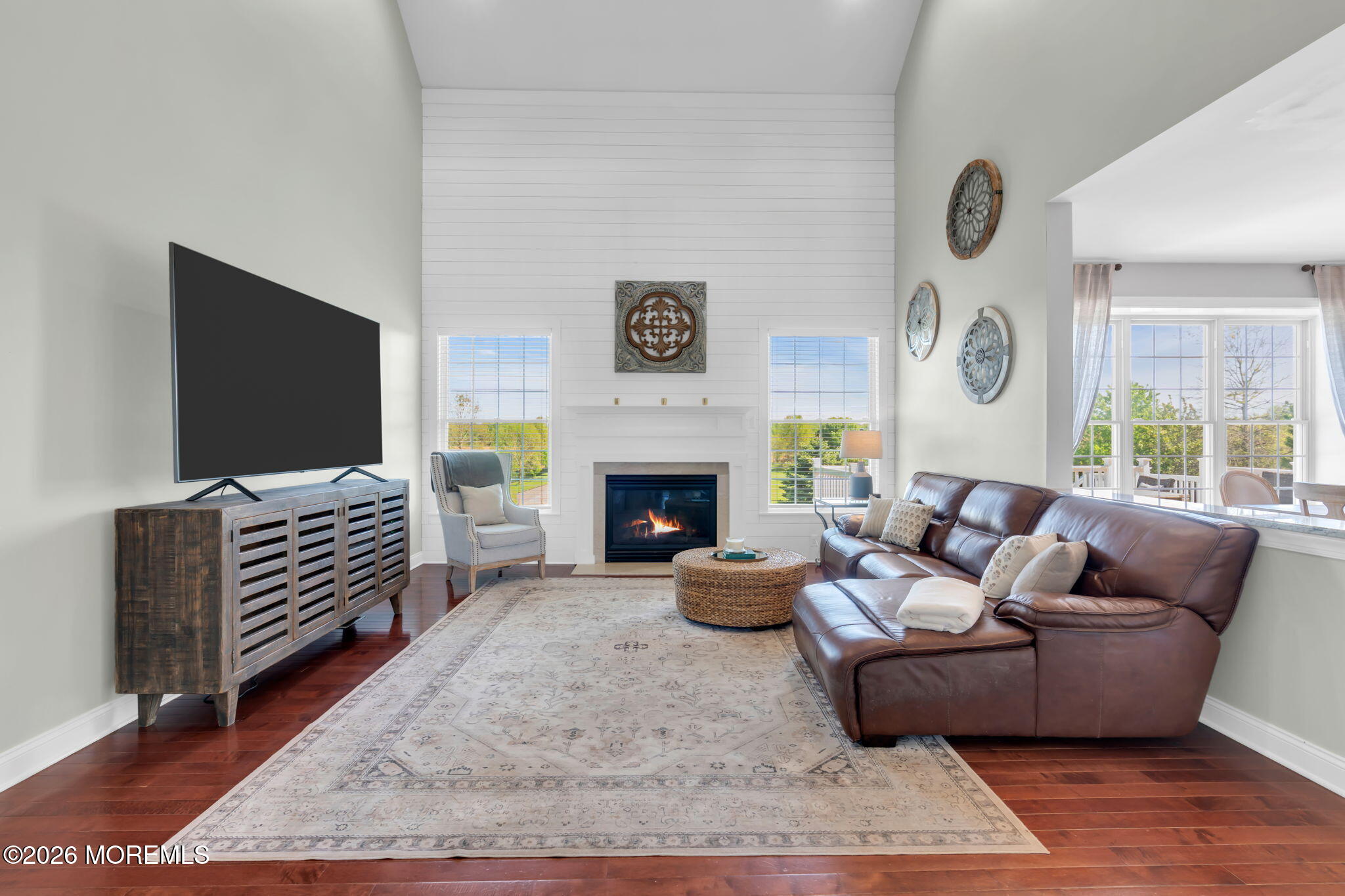 42 Ridgeview Way Allentown, NJ 08501 - Photo 11 of 47 a living room with furniture and a flat screen tv
