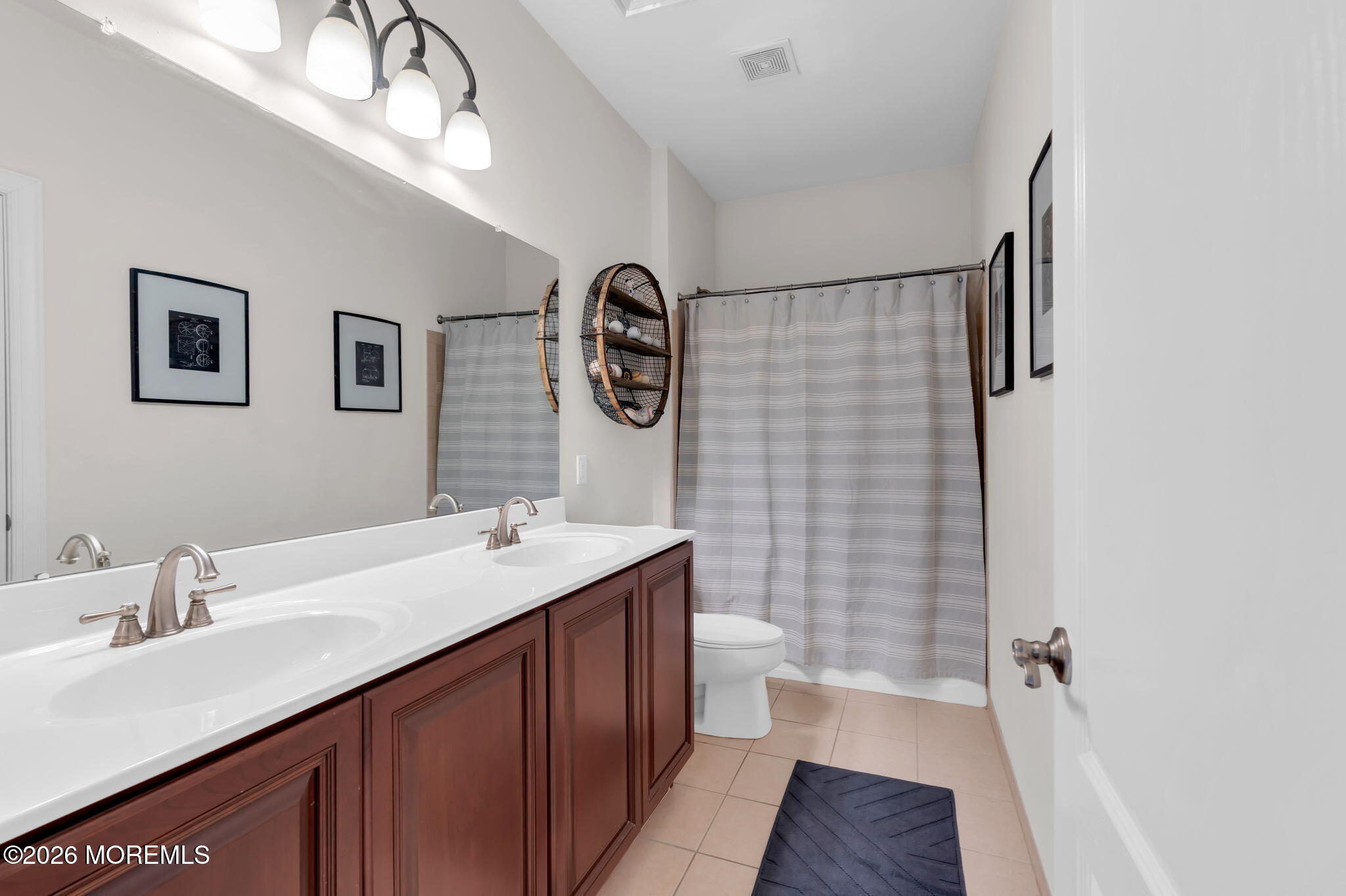 42 Ridgeview Way Allentown, NJ 08501 - Photo 28 of 47 a bathroom with a sink a toilet and shower