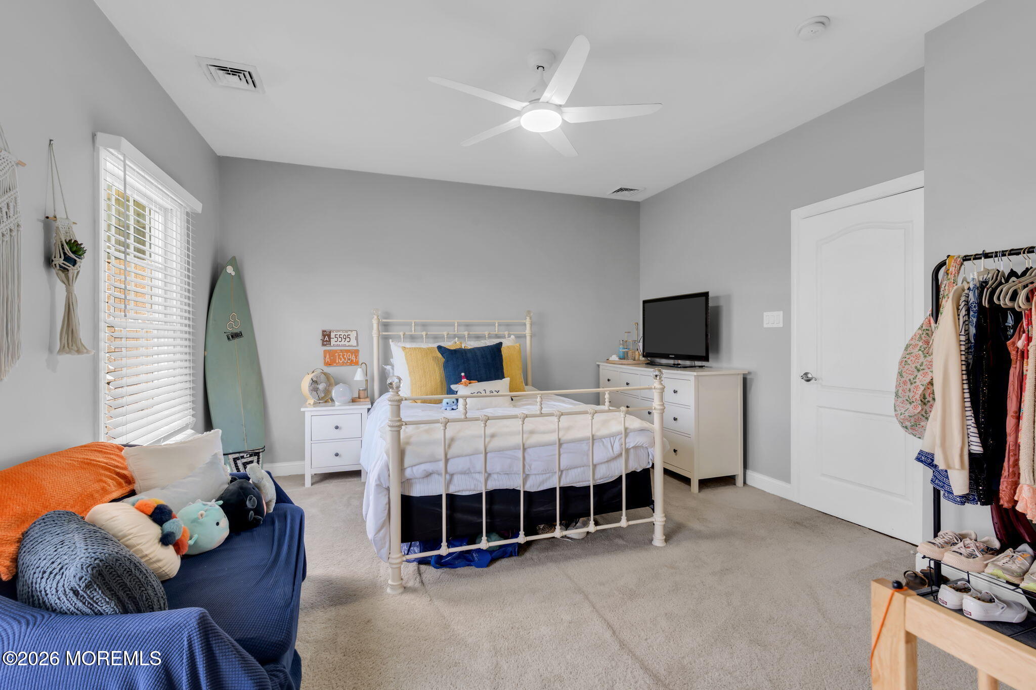 42 Ridgeview Way Allentown, NJ 08501 - Photo 30 of 47 a bed room with a bed and a television