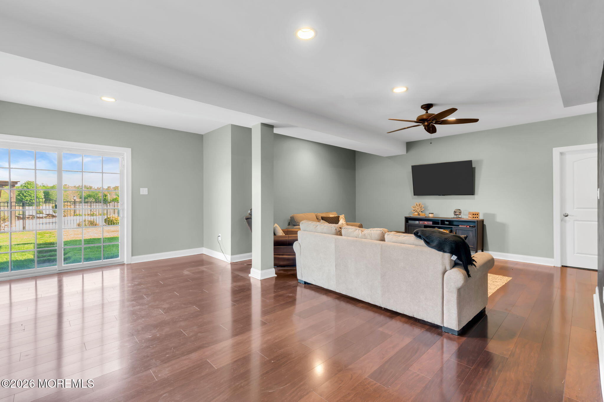 42 Ridgeview Way Allentown, NJ 08501 - Photo 39 of 47 a living room with furniture and a flat screen tv