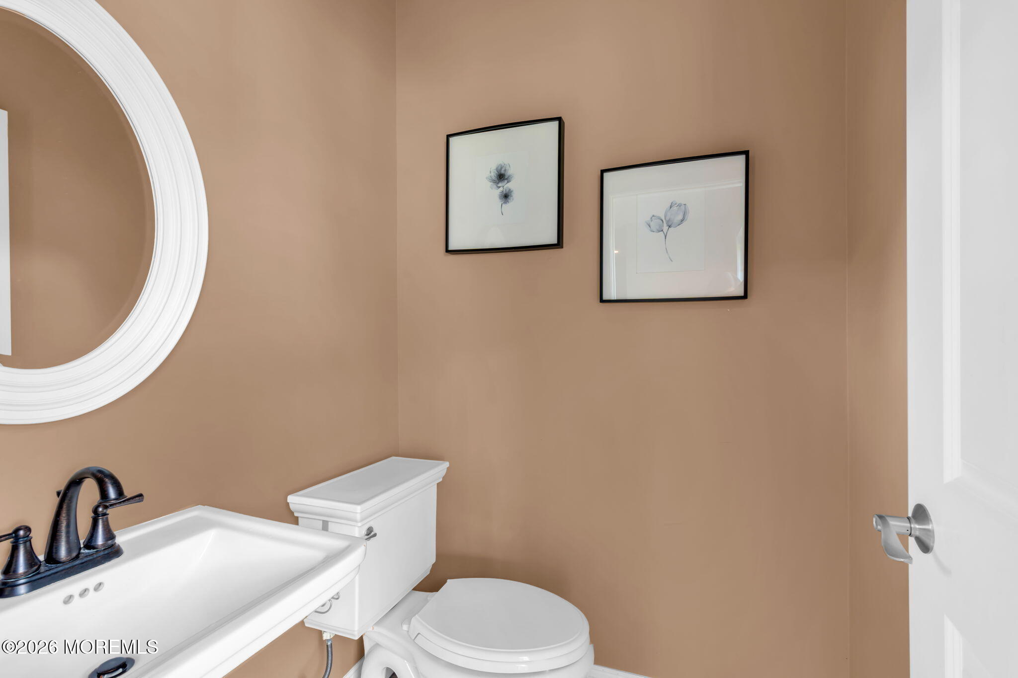 42 Ridgeview Way Allentown, NJ 08501 - Photo 40 of 47 a white toilet sitting next to a bathroom sink