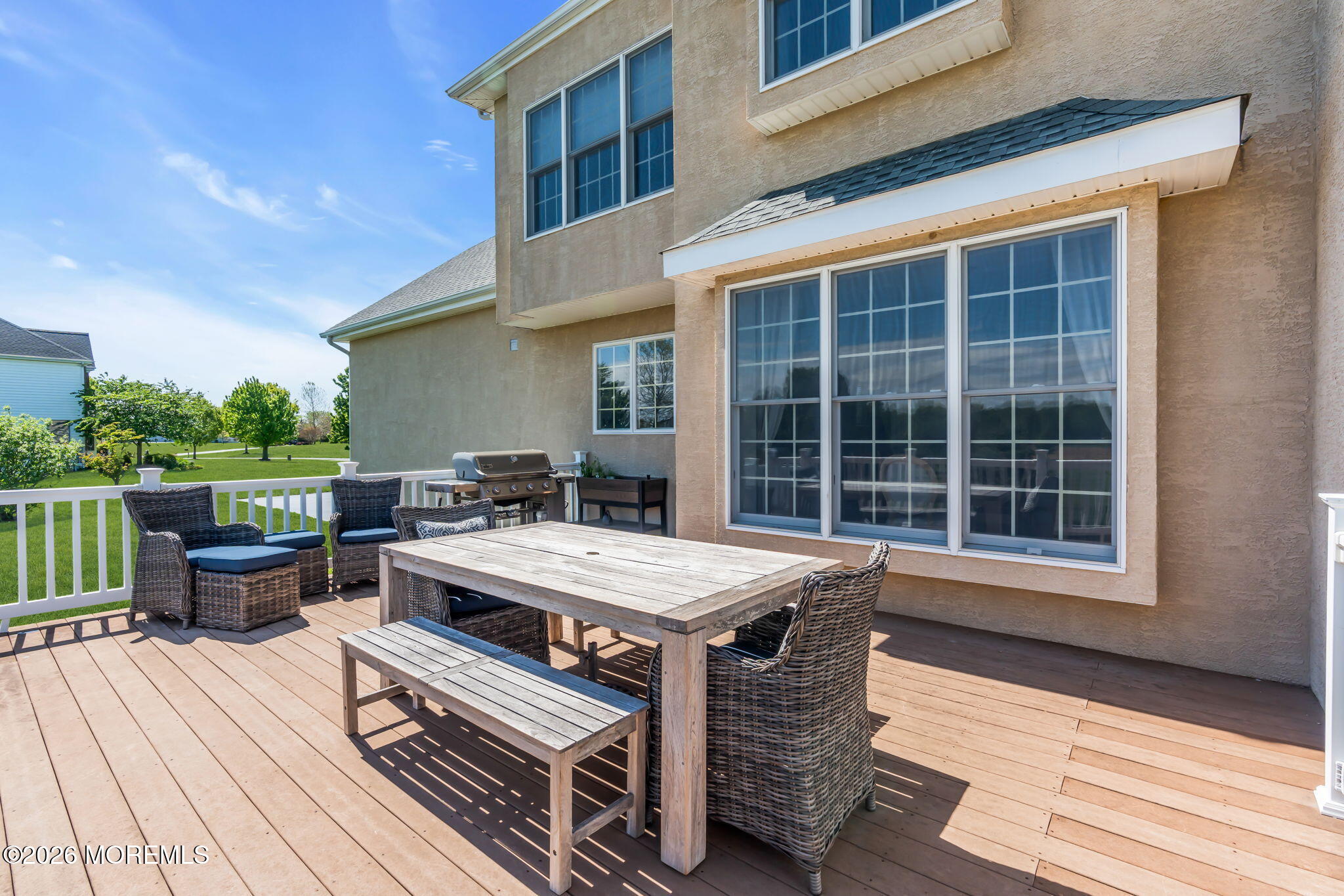 42 Ridgeview Way Allentown, NJ 08501 - Photo 41 of 47 a view of a patio with table and chairs
