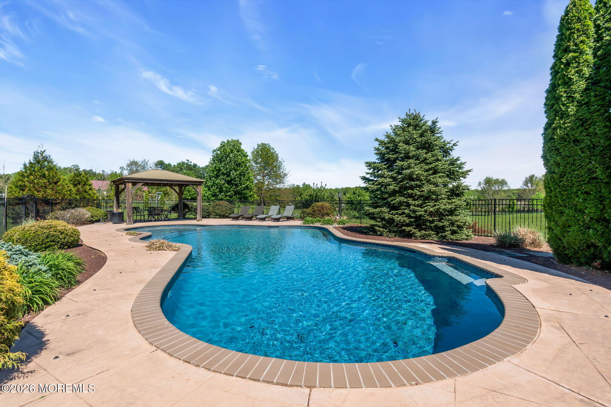 42 Ridgeview Way Allentown, NJ 08501 - Photo 43 of 47 a view of a swimming pool with a yard