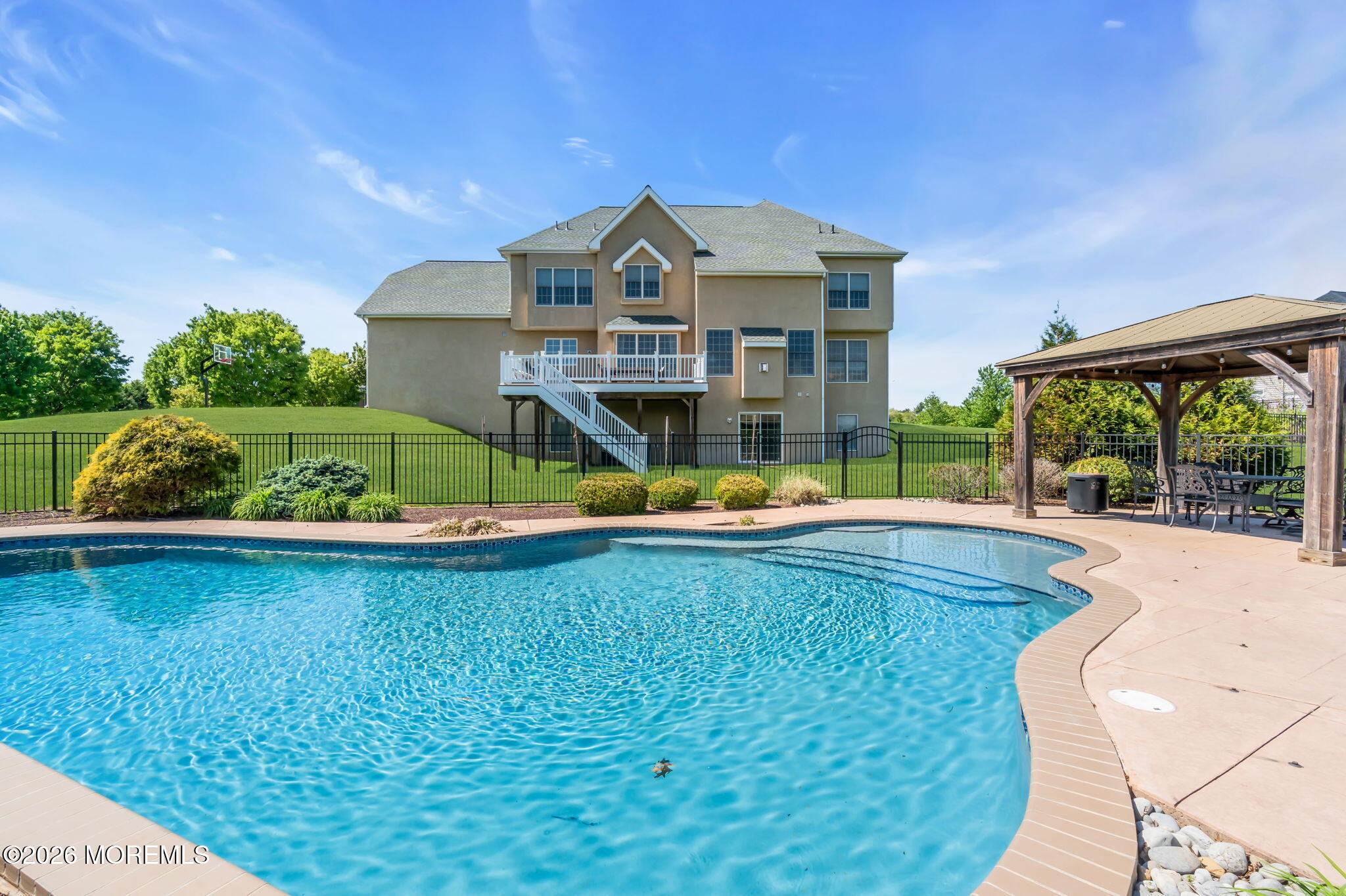 42 Ridgeview Way Allentown, NJ 08501 - Photo 44 of 47 a view of a house with pool and a yard