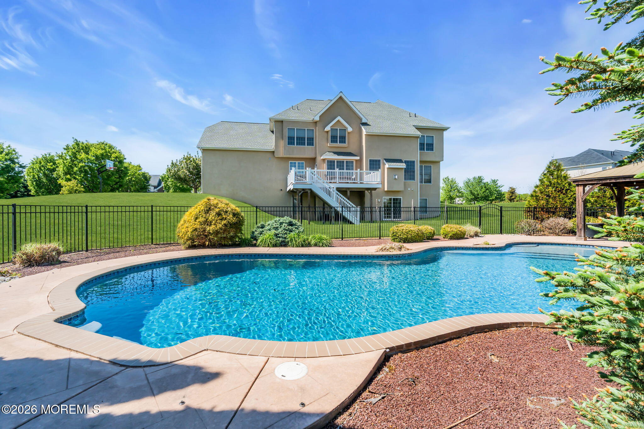42 Ridgeview Way Allentown, NJ 08501 - Photo 46 of 47 a view of a swimming pool with a garden