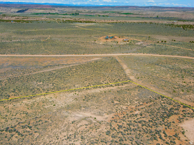 4500 South 22750th Duchesne, UT 84021 - Photo 29 of 34 Expansive undeveloped land featuring sparse desert vegetation and a dirt track