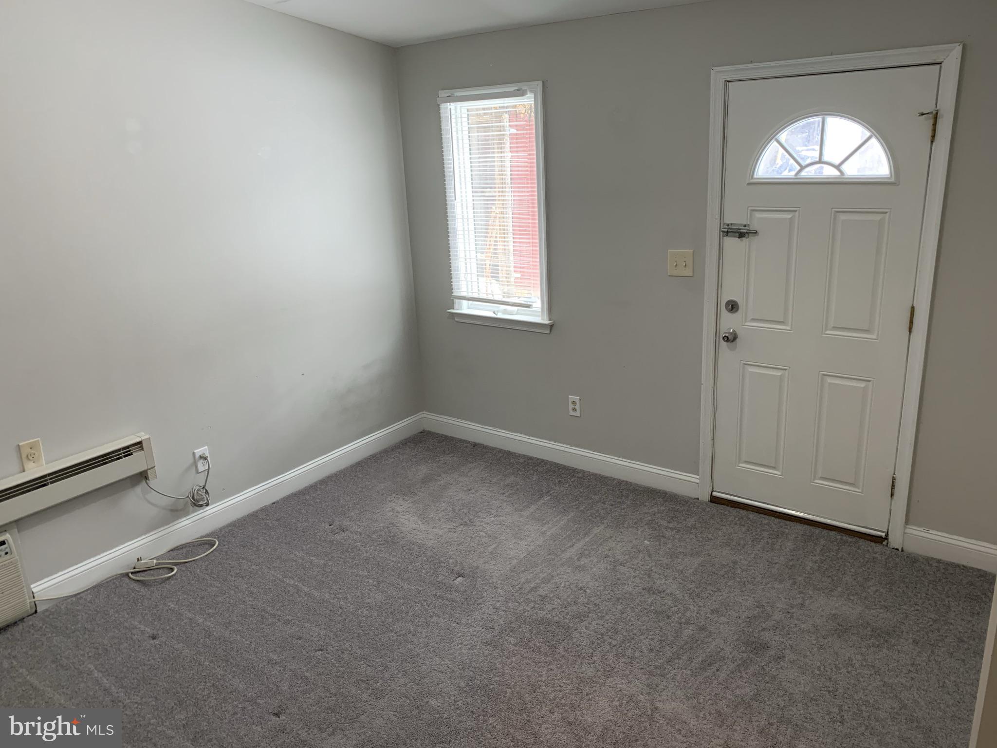 4439 Chestnut Street, Unit 1R Philadelphia, PA 19104 - Photo 16 of 22 an empty room with windows