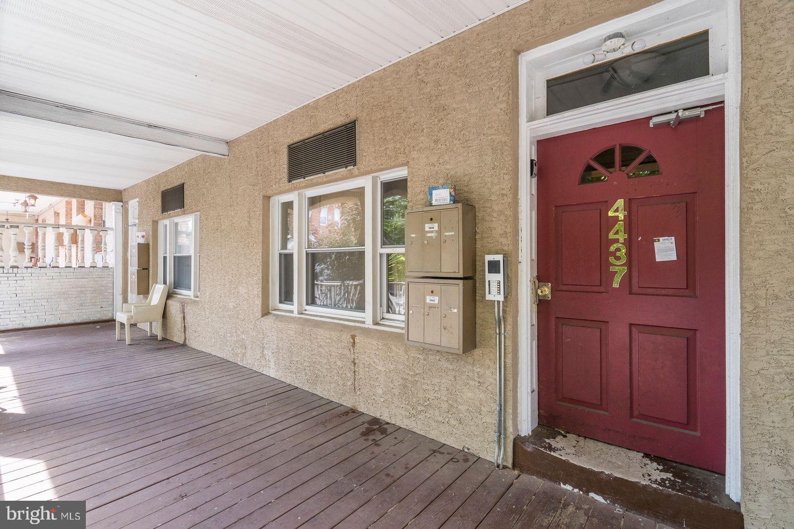 4439 Chestnut Street, Unit 1R Philadelphia, PA 19104 - Photo 2 of 22 a view of an entryway of house and wooden floor