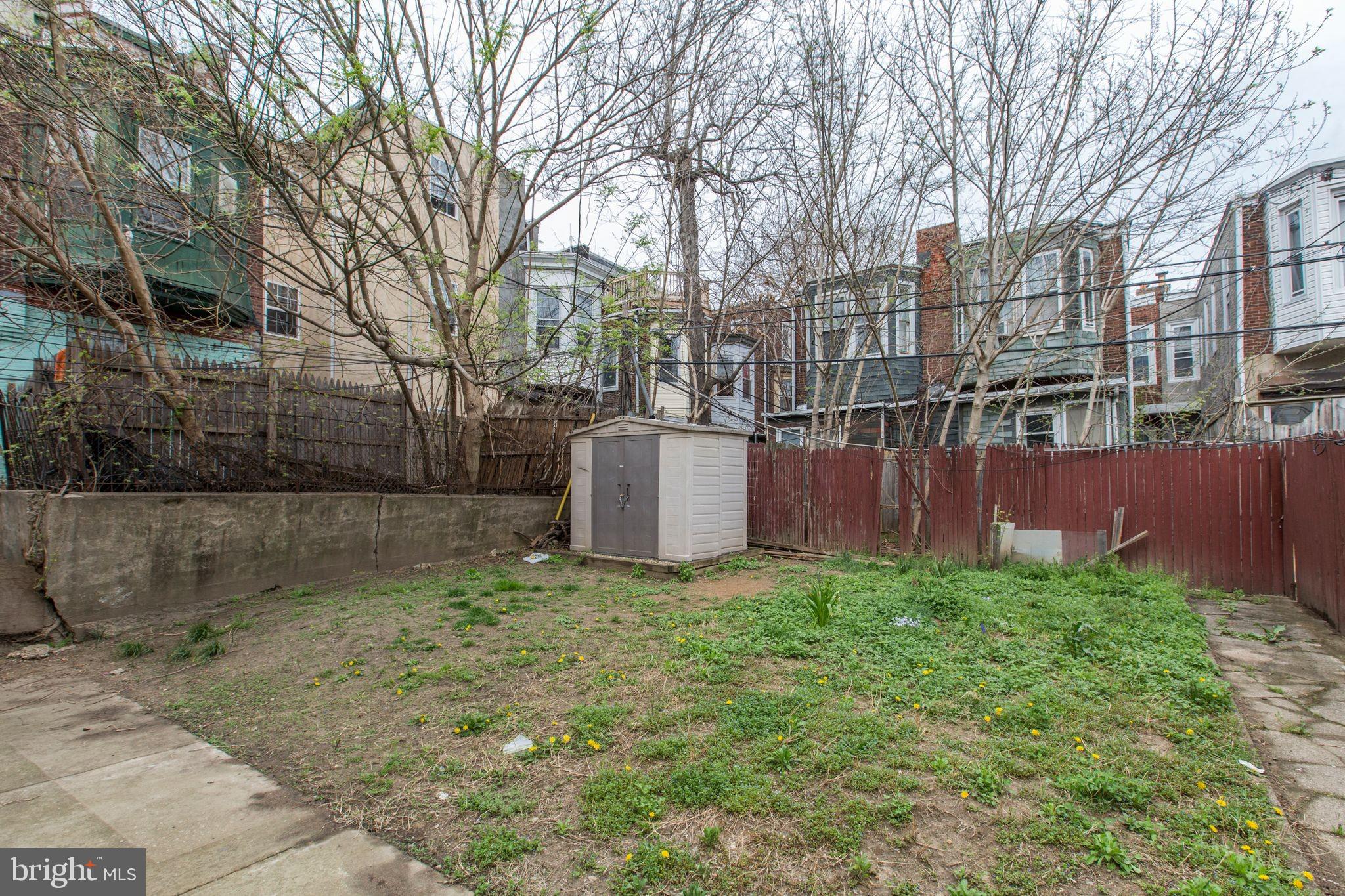 4439 Chestnut Street, Unit 1R Philadelphia, PA 19104 - Photo 22 of 22 a view of a backyard with large trees