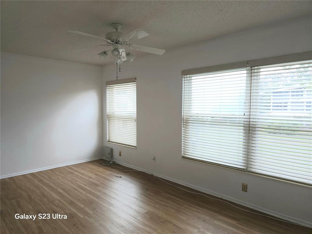 2386 Sumatran Way, Unit 44 Clearwater, FL 33763 - Photo 14 of 25 a view of an empty room with a window