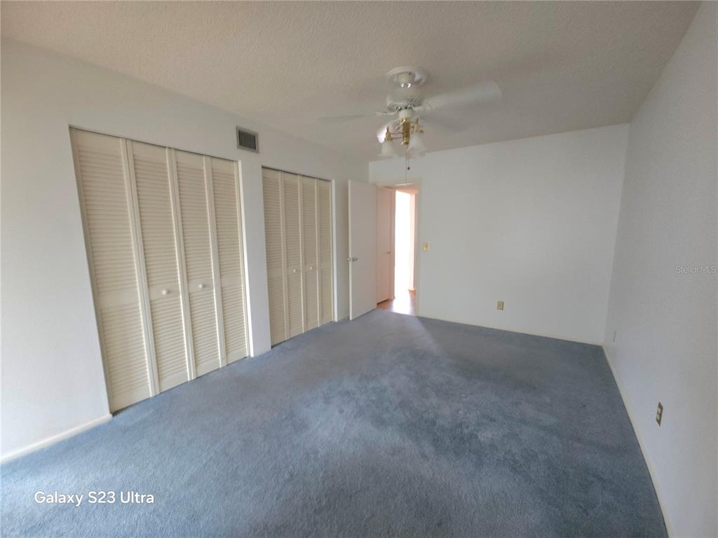 2386 Sumatran Way, Unit 44 Clearwater, FL 33763 - Photo 16 of 25 a view of a livingroom with a ceiling fan