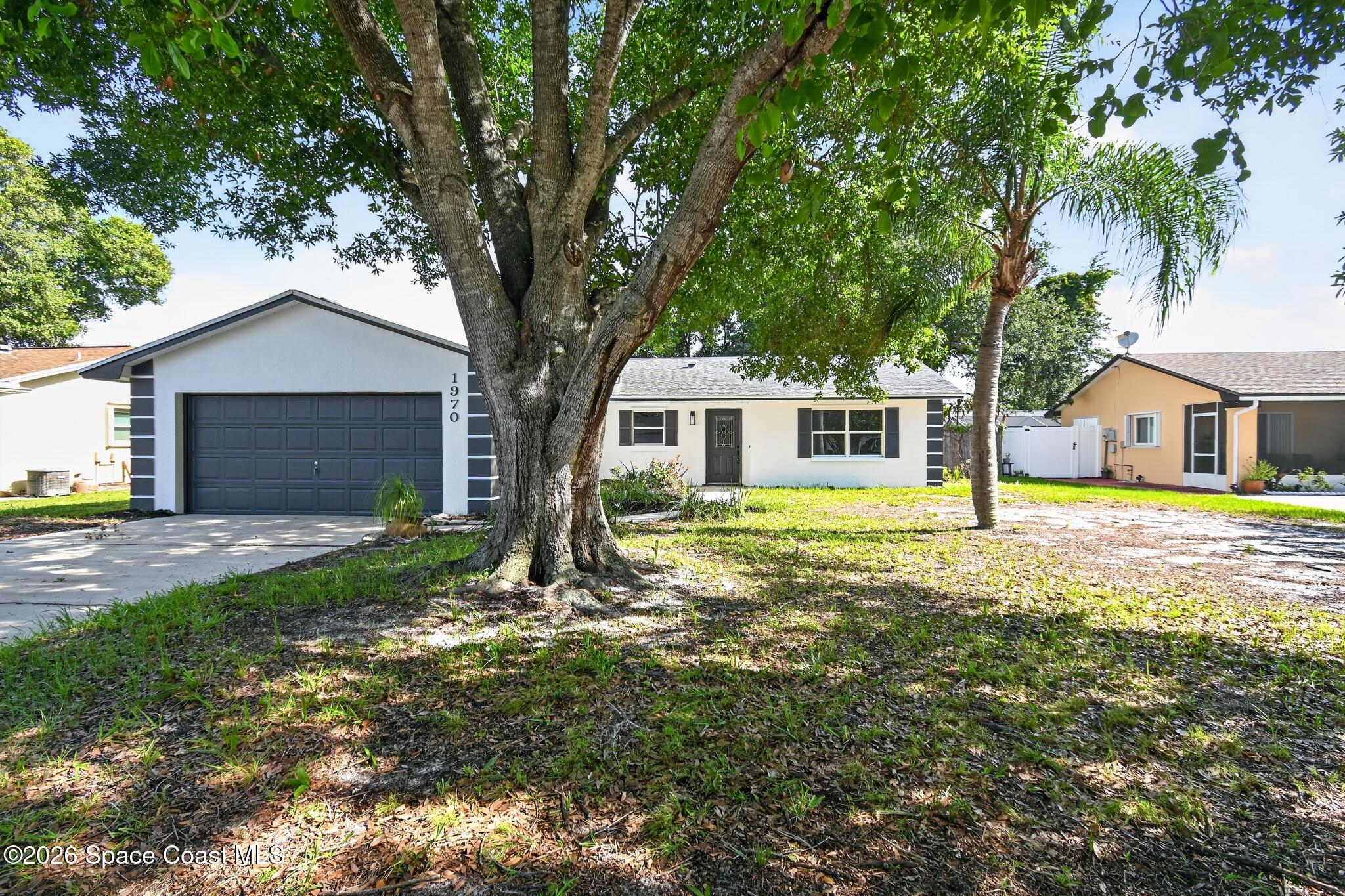 1970 Tallpalm Road Melbourne, FL 32935 - Photo 1 of 12 1970_Tallpalm_Rd-Exterior-8894