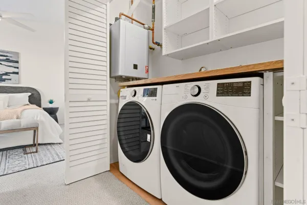 a utility room with dryer and washer