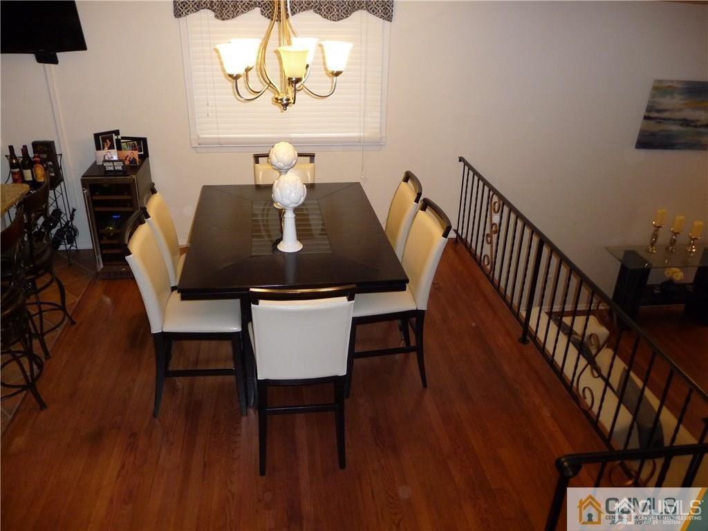116 Prentice Avenue South River, NJ 08882 - Photo 12 of 27 a view of a dining room with furniture and wooden floor